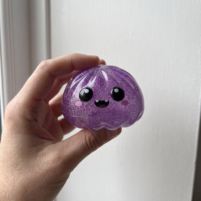 NIBBLES, the purple glitter monster squishy